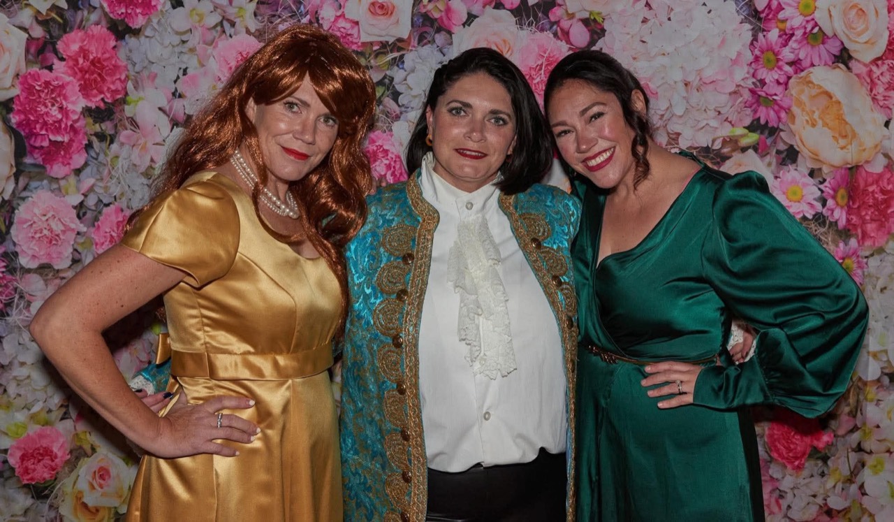 Guests in elegant evening wear at Parent Prom