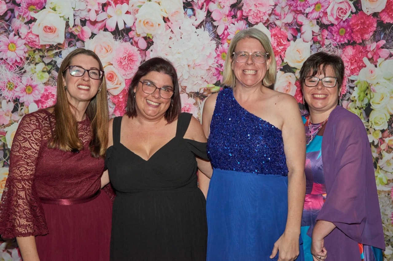 Friends celebrating together at Parent Prom
